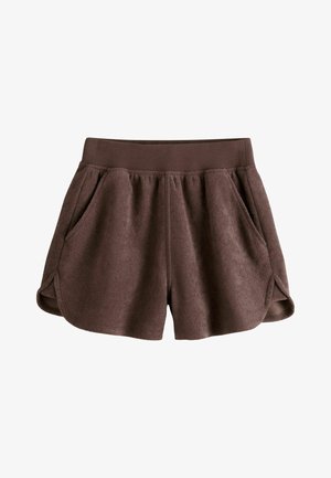 Brown fleece shorts with wide elastic waistband, side pockets, and curved hem on both legs.
