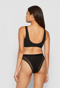 Calvin Klein Underwear UNLINED BRALETTE - Bustino - black/sunny lime
