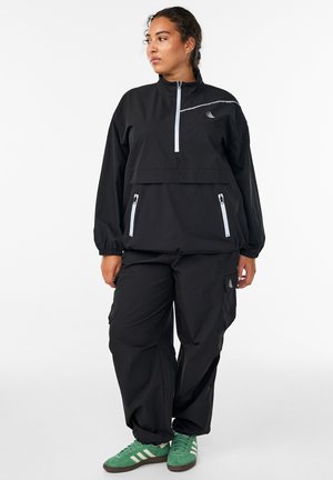 MIT CARGOTASCHEN - Hlače - black