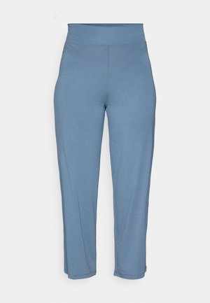 Svijetlo plave tajice koje su prilagođene tijelu, s visokim pojasom, glatkom teksturom i ravnim krojem. Bez vidljivih uzoraka ili dodataka.