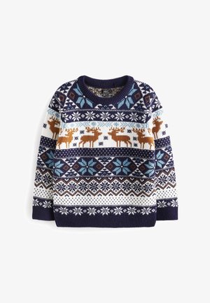 Suéter tejido en azul marino y blanco con ciervos marrones y patrones geométricos de copos de nieve en azul, blanco y marrón a lo largo del cuerpo y las mangas.