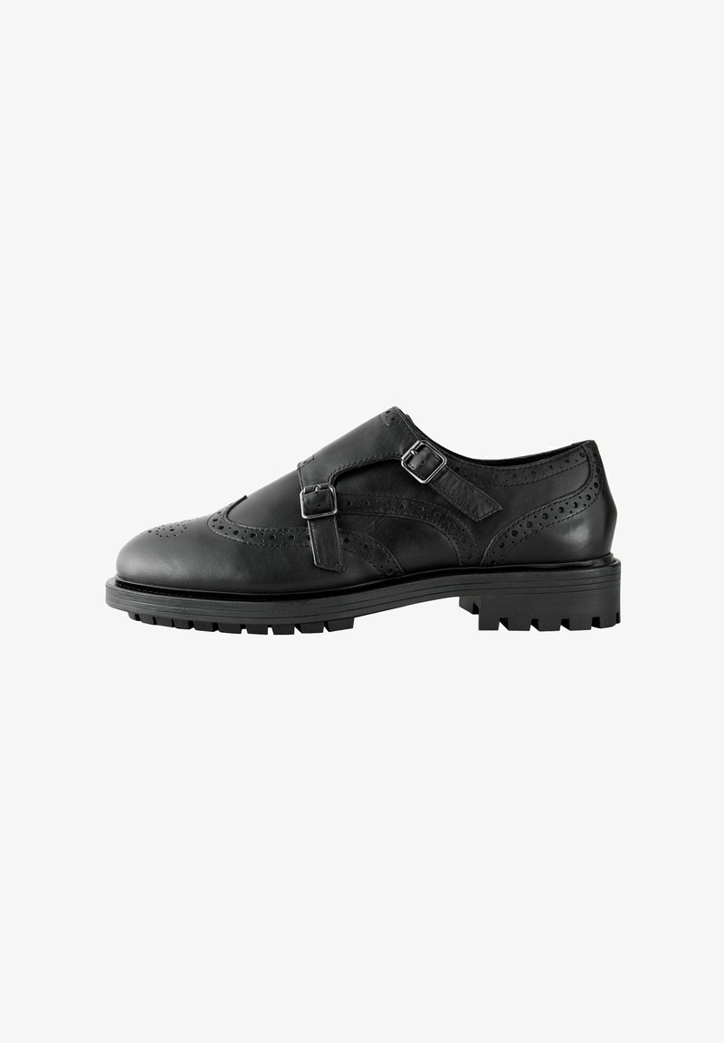 Mustad must värvi brogue jalatsid kahekordse lukuga, tekstuursete detailidega, tiibadega disain ja vastupidav tald.