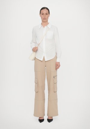 BAGGY - Cross body bag - ivory
