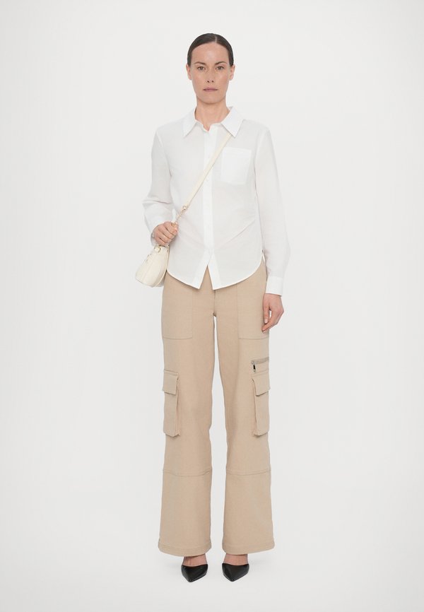 BAGGY - Cross body bag - ivory