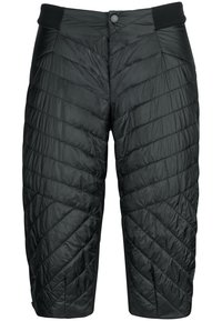 Pantaloni neri isolati con un design trapuntato, cuciture diagonali, una texture liscia e chiusura con bottone in vita.