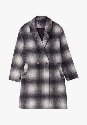 Cappotto doppiopetto con motivo a quadri bianco e nero. Presenta bottoni grandi, due tasche frontali e un colletto a punta. Tessuto testurizzato.