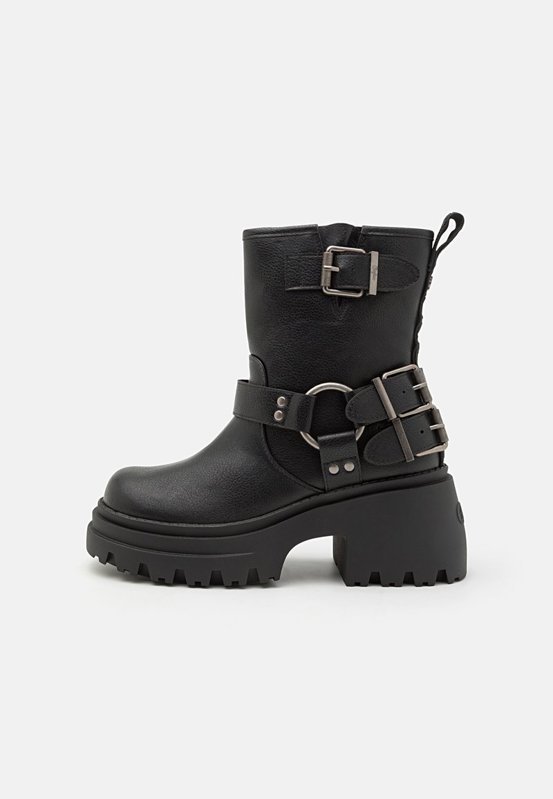 Bottines noires en cuir texturé, dotées d'une semelle plateforme épaisse, de boucles ajustables et d'une semelle extérieure robuste à crampons.