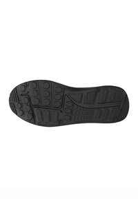 Suola di scarpa in gomma nera con motivi testurizzati, caratterizzata da design esagonali e zigzag per una maggiore trazione. Nessun marchio visibile o elementi decorativi.