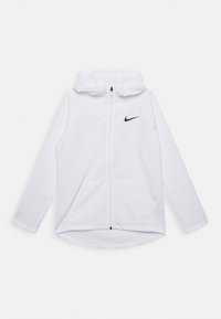 Hvid Nike jakke med hætte, fuld lynlås, skjulte lommer og sort logo på venstre bryst. Fremstillet af let, glat stof.