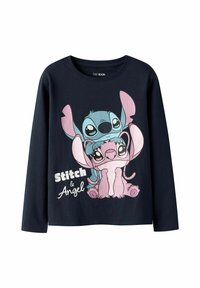 Chemise à manches longues marine avec un graphique de cartoon de Stitch et Angel. L'impression comprend des couleurs pastel et le texte "Stitch & Angel" en blanc.