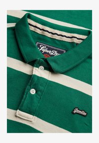 No seleccionado, green stripe