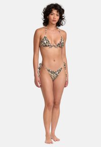 Floral bikini set with a black background, featuring triangle top and tie-side bottom. Made from soft fabric, showcasing vibrant colorful flowers.
