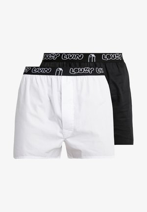 Boxershorts aus schwarzer und weißer Baumwolle. Mit elastischem schwarzen Bund mit "LOUSY LIVIN"-Logo. Glatte Textur und standardmäßiger boxy Schnitt.
