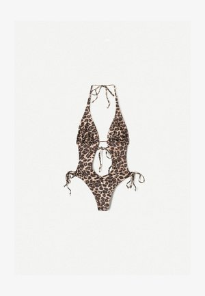 Maillot de bain une pièce imprimé léopard avec un décolleté en V profond, des côtés découpés et des liens ajustables au cou et aux hanches. Texture de tissu lisse.