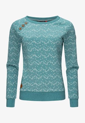 Pull à manches longues bleu sarcelle avec motifs géométriques clairs, trois boutons décoratifs en bois à l'épaule gauche et poignets et ourlet côtelés.