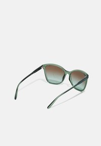 VOGUE Eyewear Ochelari de soare - transparent/mallard green