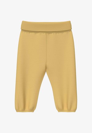 Miękkie żółte spodnie dla maluchów z elastycznym pasem i ściągaczami u dołu nogawek, zaprojektowane na wygodne codzienne noszenie.