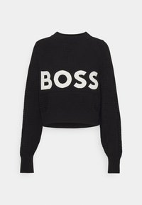 Svart kort sweatshirt med strukturerad tyg och långa ärmar. Har en iögonfallande vit "BOSS"-logotyp över bröstet. Ribbad halsringning och manschetter.