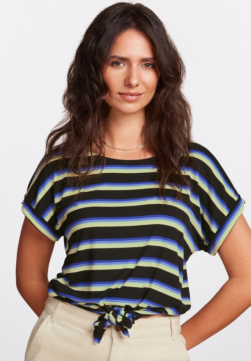 Striped short-sleeve t-shirt featuring black, green, and blue horizontal lines, with a knotted detail at the waist and rolled cuffs.