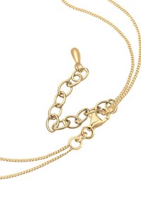 Collier en chaîne de couleur or, avec deux brins entrelacés, un fermoir type homard et une chaîne ajustable. Texture lisse sur toute la surface.