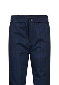 Pantaloni navy con un motivo a quadri scuro, dotati di una vita elastica e chiusura a bottone sul davanti. Tessuto dalla superficie liscia.