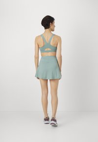 Girlfriend Collective FLOAT FLOUNCE SKORT - Športno krilo - chinoiserie