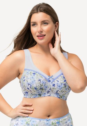 Blomstret bh i lys blå, med justerbare stropper, en glat tekstur og en sløjfeaccent i midten. Designet til komfort og støtte.