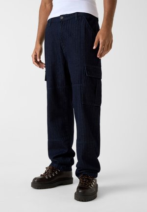 - Jeansy Relaxed Fit