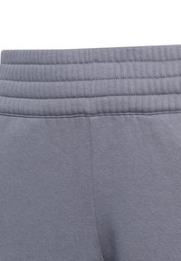 Graue Sweatpants aus einem Baumwollmischgewebe verfügen über einen strukturierten, gerippten Bund und einen glatten Stoff. Das Design legt Wert auf Komfort mit einer entspannten Passform.