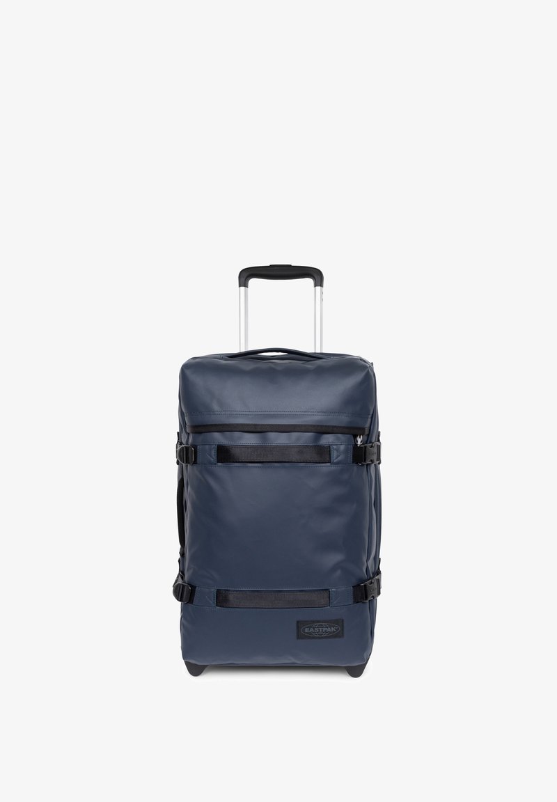 Marineblaue Rollgepäcktasche aus strapazierfähigem Stoff, mit schwarzen Gurten, einem ausziehbaren Griff und einer kompakten rechteckigen Form.