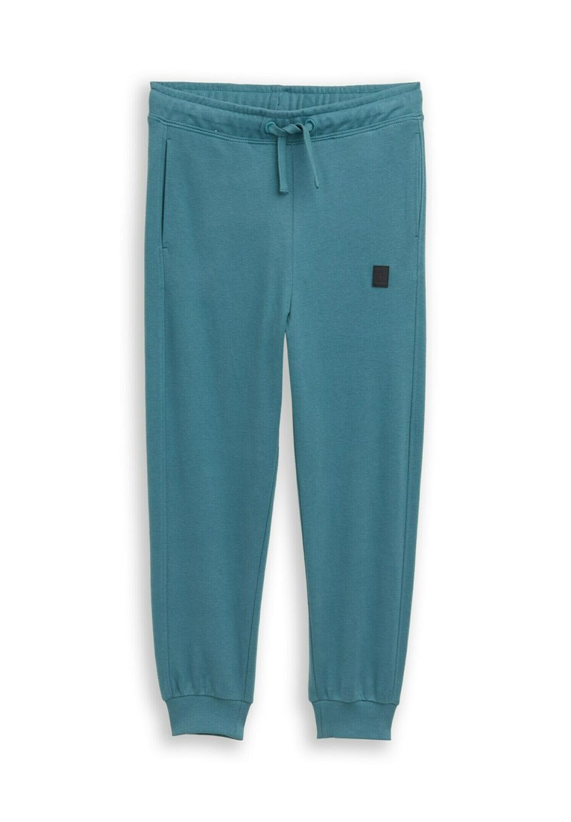 Pantalon de jogging turquoise en tissu doux, doté d'une taille élastique avec cordon de serrage, de poches latérales et de poignets côtelés.