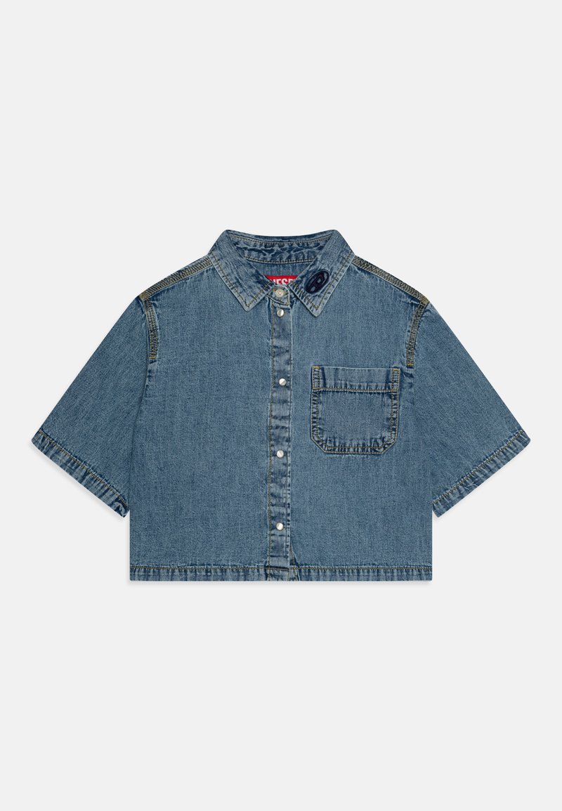 Cropped denim shirt in medium blue, featuring short sleeves, a button-up front, a small chest pocket, and contrasting stitching details.
