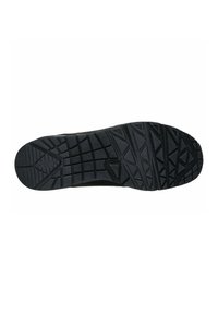 Suela de zapato atlético de goma negra con un patrón texturizado que presenta formas geométricas para agarre y tracción. Diseño plano, materiales duraderos.