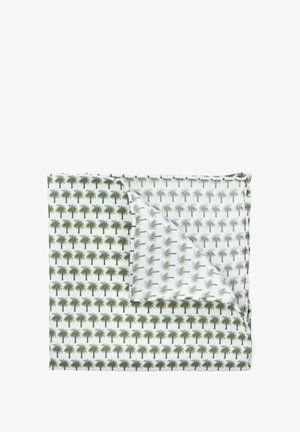 Wzorzysta narzuta z palmami w zielonym i szarym kolorze na białym tle, z zegnięciem w rogu odsłaniającym mniejszy wzór palm.