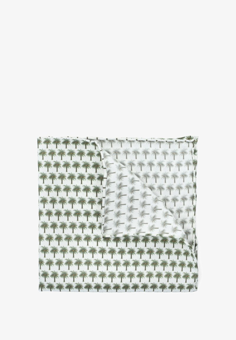 Wzorzysta narzuta z palmami w zielonym i szarym kolorze na białym tle, z zegnięciem w rogu odsłaniającym mniejszy wzór palm.