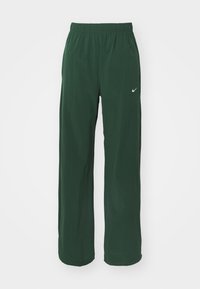 Zelené, lehké kalhoty Nike s elastickým pasem, volným střihem a decentním logem na dolní levé straně. Hladká textura a jednoduchý design.