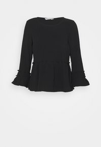 Schwarzes Langarmoberteil aus strukturiertem Stoff, mit Rundhalsausschnitt und Rüschensaum sowie -manschetten. Die Peplum-Silhouette betont das Design.
