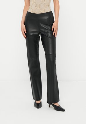 GENTIAN FLARED PANTS - Pantaloni di pelle - black