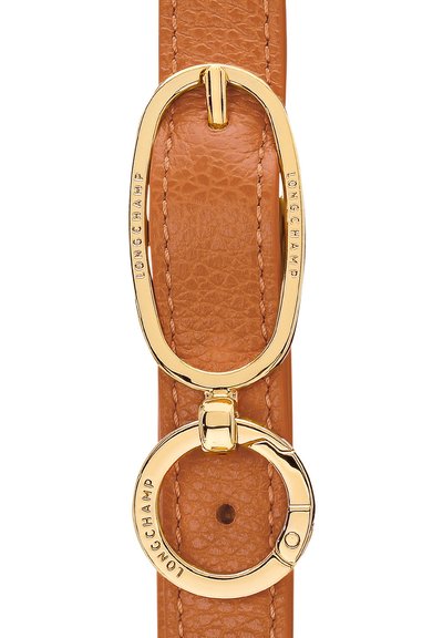 Brown leather strap with a textured finish, featuring a gold-tone oval buckle and a circular ring, both engraved with "LONGCHAMP."