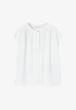 Biała bluzka z krótkim rękawem, okrągłym dekoltem i zapięciem na guziki. Posiada pionowe fałdy i boczne rozporki dla luźniejszego fasonu. Gładki materiał.