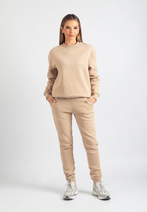 HARPER - Tracksuit bottoms - tan