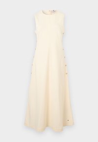 Αμάνικο κρεμ φόρεμα με υψηλό λαιμόκοψη, πλαϊνές χρυσές λεπτομέρειες με κουμπιά και αέρινη σιλουέτα σε γραμμή Α.