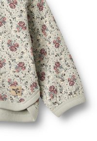 Felpa con motivo floreale in morbido tessuto grigio, caratterizzata da fiori rosa e blu, polsini a coste e un'etichetta con il logo nell'angolo inferiore.