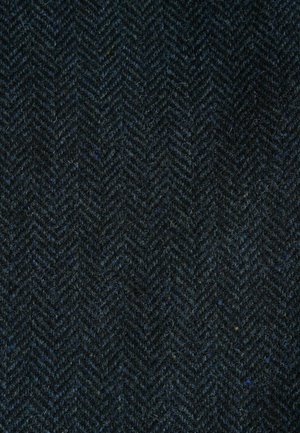 Tessuto a spina di pesce in blu scuro e nero. Texture in lana con sottili puntini blu e gialli. Materiale strutturato e durevole.