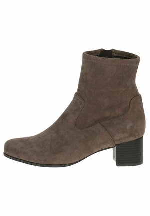 Brown suede ankle boot with a block heel, smooth texture, and curved side cutouts. Features a rounded toe and minimal decorative accents.