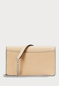 Beige clutch purse made of textured material, featuring a flap closure, a detachable chain strap, and dark edge detailing.