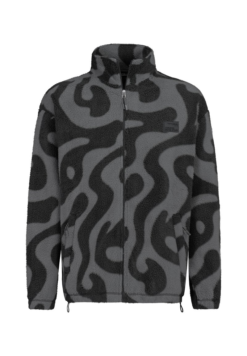 Fleecevest in grijs met een zwart abstract swirlpatroon. Voorzien van een hoge kraag, ritssluiting en zijzakken. Zacht, gestructureerd oppervlak.