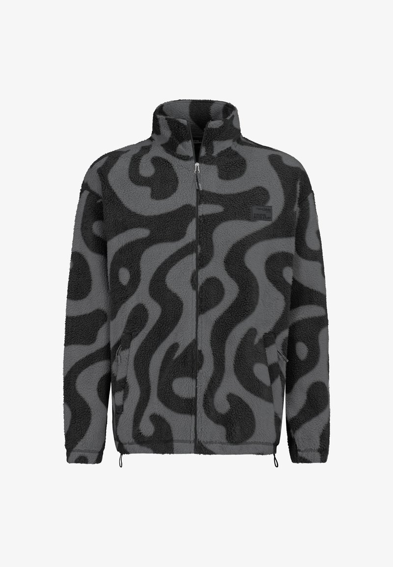 Fleecevest in grijs met een zwart abstract swirlpatroon. Voorzien van een hoge kraag, ritssluiting en zijzakken. Zacht, gestructureerd oppervlak.