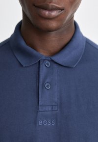 BOSS DYE - Polo majica - open blue