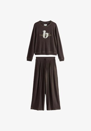 Dark brown waffle-knit long-sleeve top with "Ted Baker" logo and matching wide-leg drawstring pants.